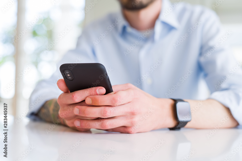 Close up of business man working using smartphone Close up of business man working using smartphone