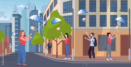 people catching parcel boxes falling down with parachute from sky transportation shipping package air mail express delivery concept modern city street cityscape background full length horizontal