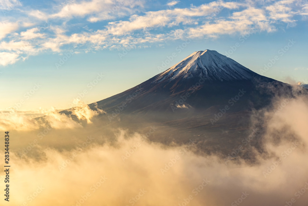 Fuji Mountain and the mist in Autumn at beautiful sunrise, Lake Kawaguchiko,Yamanashi,Japan. Mount Fuji is the highest mountain in Japan.