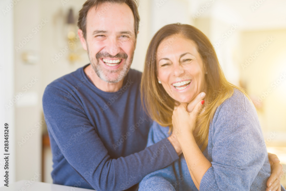 Romantic middle age couple in love at home Romantic middle age couple in love at home