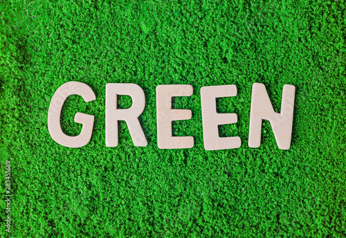 Green word on green grass