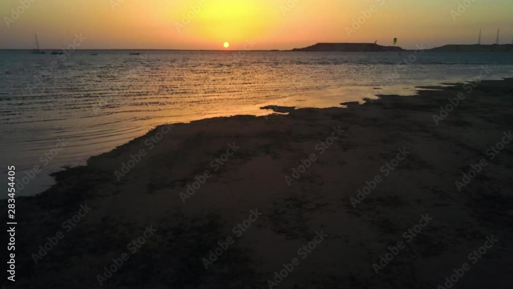 Aerial: Kiteboarding in Beautiful Sunset, Dahkla, Morocco Aerial: Kiteboarding in Beautiful Sunset, Dahkla, Morocco