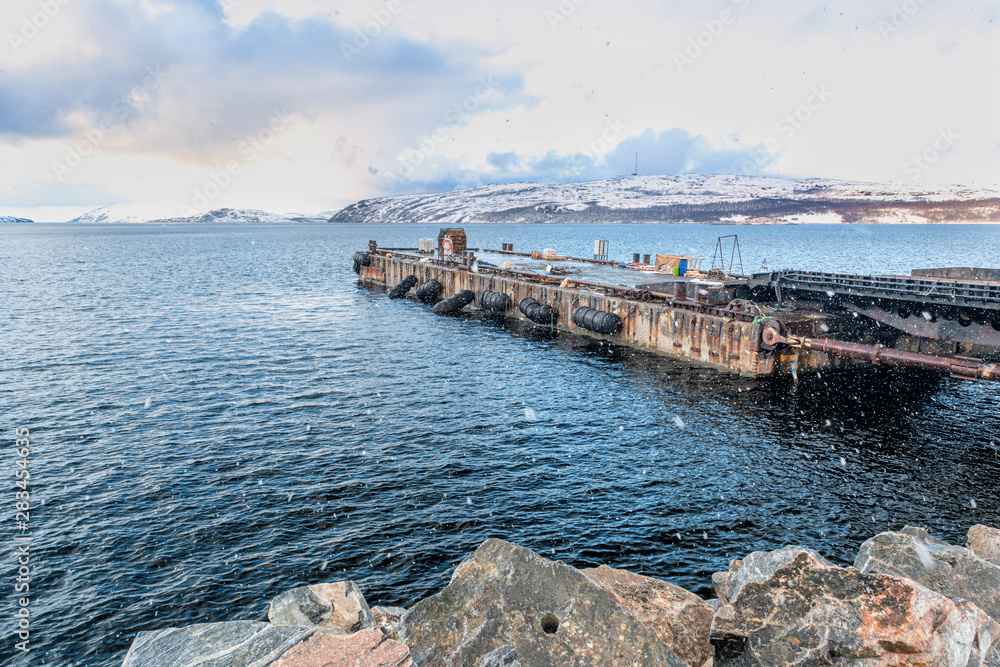 Sea boat pier in the north Norwegian town Kirkenes
