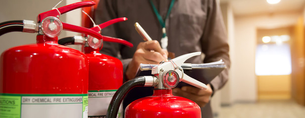 Fire extinguishers, Engineers are checking fire extinguishers.