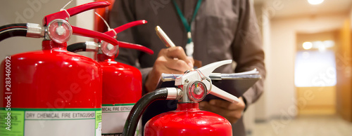 Fire extinguishers, Engineers are checking fire extinguishers.