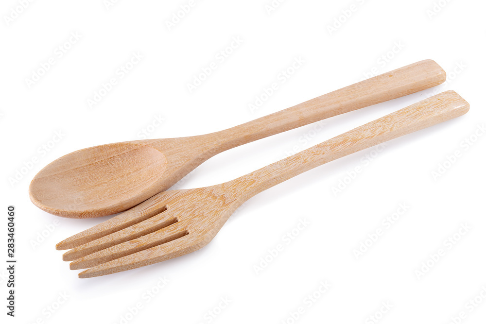 Wooden spoon and wooden fork isolated on white background Wooden spoon and wooden fork isolated on white background