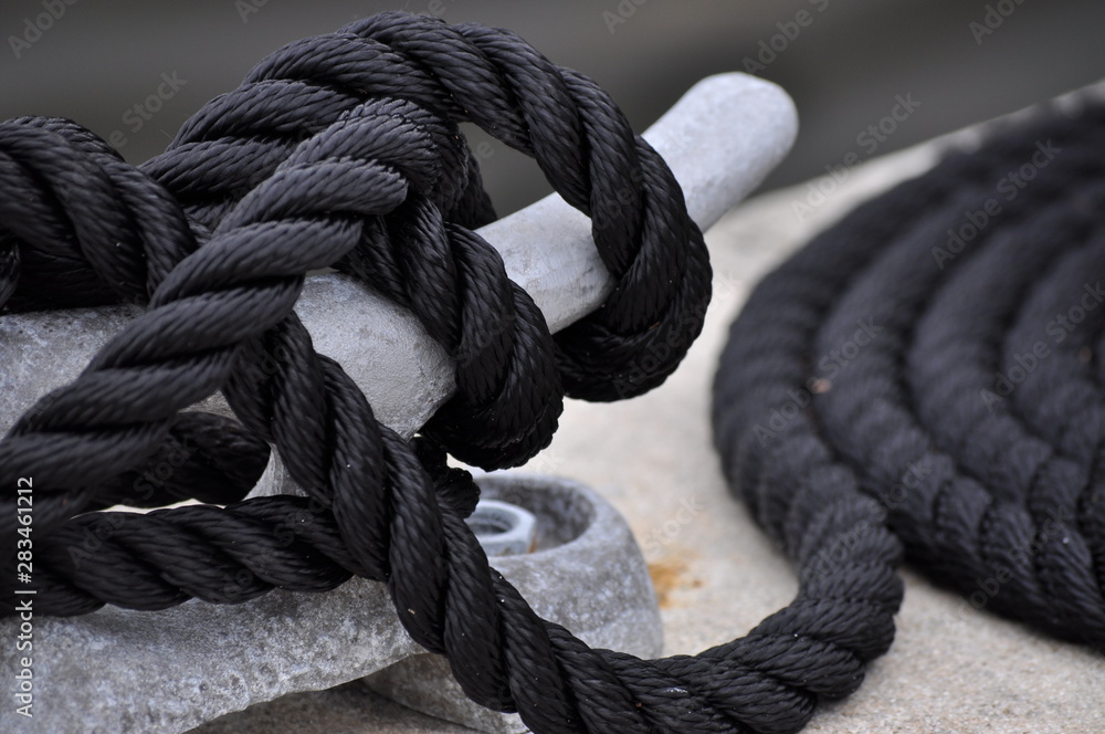 close up of a sealing rope tie to a metal 