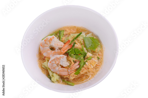 Sukiyaki,Shabu(Thai Suki) asian food in broth Mixed sea food with prawn,squid slide,eggs,vermicelli,vegetable, served with sesame & tofu mashed sauce, spicy sweet & sour a bit, on white background.