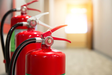fire extinguisher on the fire escape in the building.