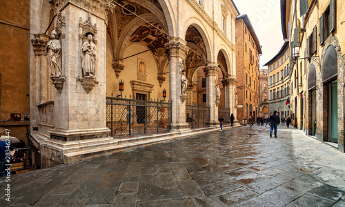 Fototapeta Naklejka Na Ścianę i Meble -  Old medieval streets of Siena, Tuscany, Italy. Siena architecture and landmark. Picturesque streets of Siena, Italy.Travel destination of Italy and Siena. 