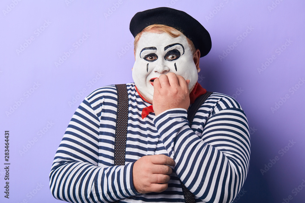 Terrified fat mime artist being afraid of children. facial expression ...