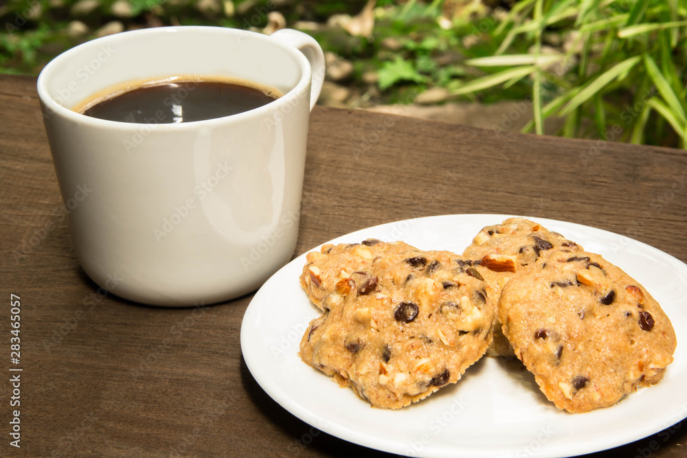 Cup of coffee and chocolate cookies Cup of coffee and chocolate cookies