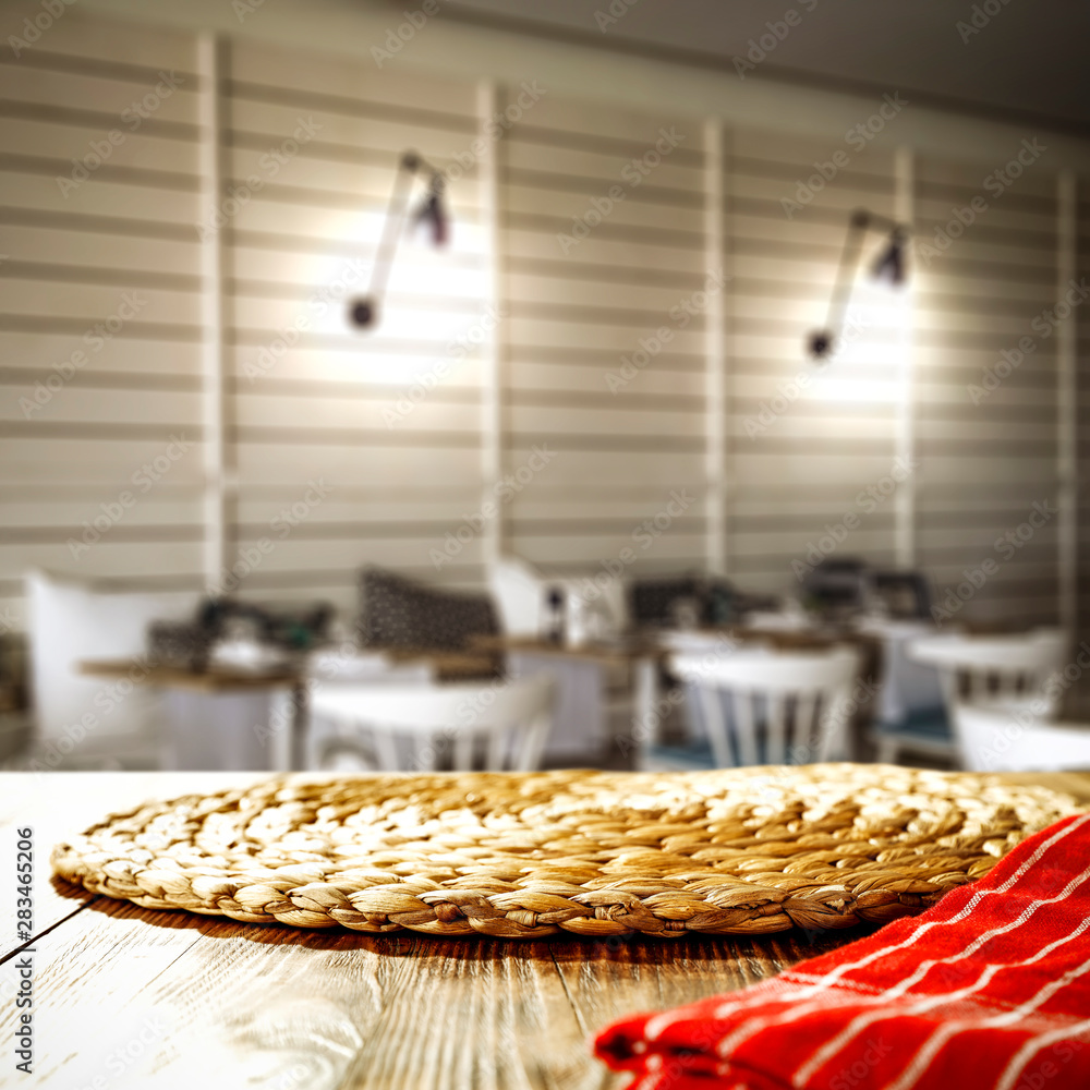 Obraz premium Table background and restaurant interior. Empty space for products and decoration.