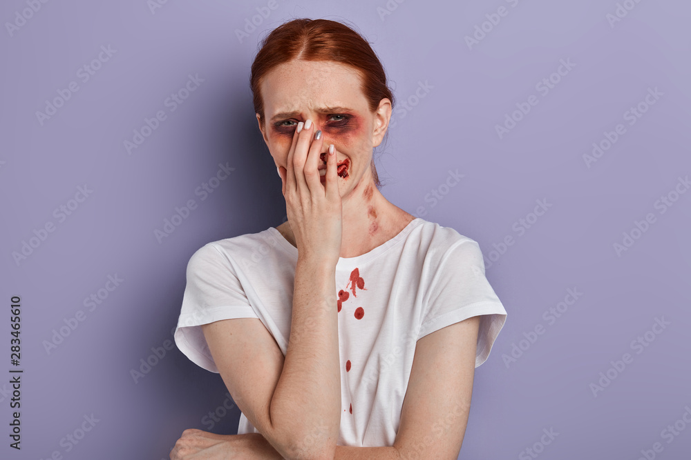 crying girl remembers her awful moments of life. woman closing her mouth with palm and weeping crying girl remembers her awful moments of life. woman closing her mouth with palm and weeping
