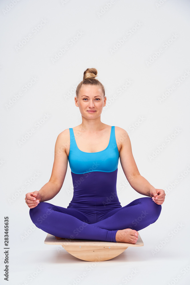 girl in gym clothes for Pilates and yoga.
