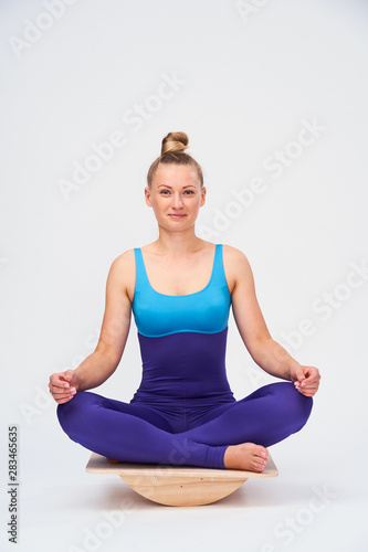 girl in gym clothes for Pilates and yoga.