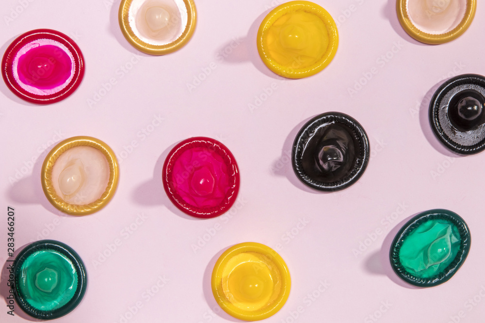 Top view colorful unwrapped condoms Top view colorful unwrapped condoms