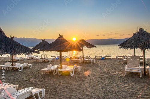 Dojran  Macedonia     Sunrise scene     sunshades on beach