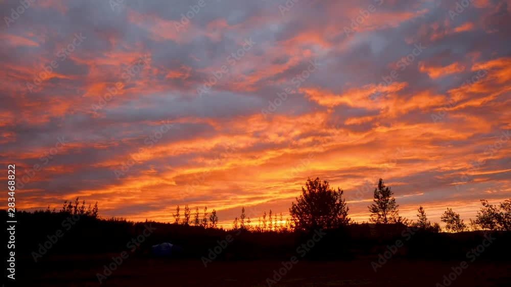 Red coloured clouds at sunset or red sky at the Golden Circle Iceland. Time lapse. Red coloured clouds at sunset or red sky at the Golden Circle Iceland. Time lapse.
