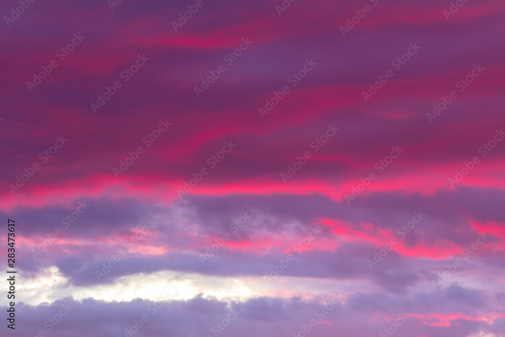 Beautiful clouds at sunset as a background