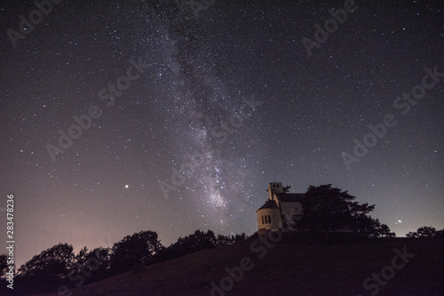 Old church on the Monte Bignone Sanremo with milky way in background