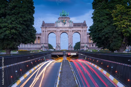 Triumphal Arch and Brussels evening street