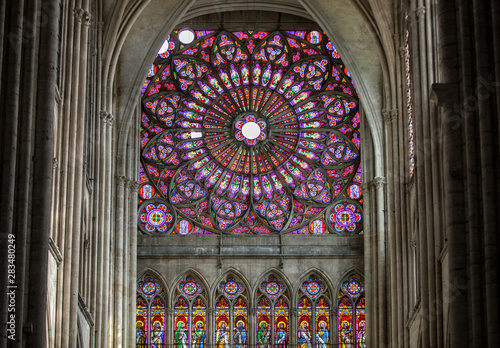 Colorful stained glass windows in Troyes Cathedral dedicated to Saint Peter and Saint Paul. France.