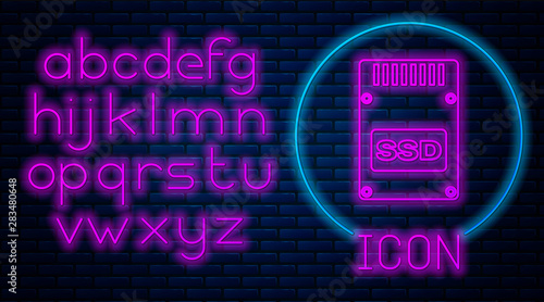 Glowing neon SSD card icon isolated on brick wall background. Solid state drive sign. Storage disk symbol. Neon light alphabet. Vector Illustration photo