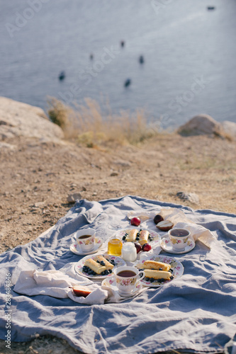 Beautiful picnic on top of mountain with sea view.