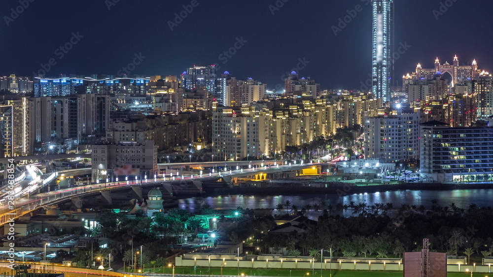 Palm Jumeirah Highway bridge aerial night timelapse. Dubai, United Arab Emirates
