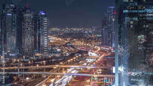 Dubai Marina and JLT aerial night timelapse top view of skyscrapers in Dubai, UAE.