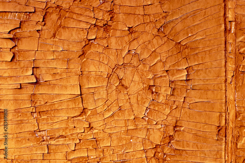 old wooden surface in yellow paint close-up