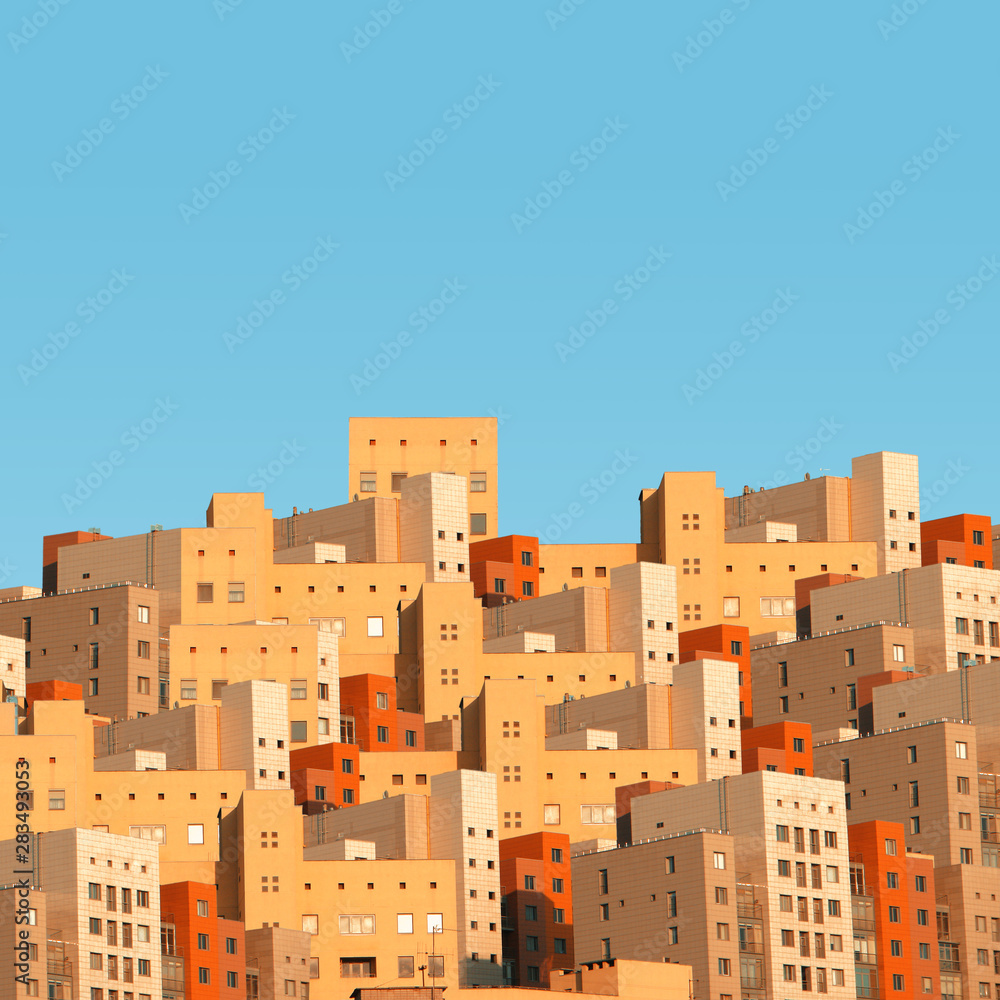 Surreal architecture. Buildings in the sunlight against the blue sky