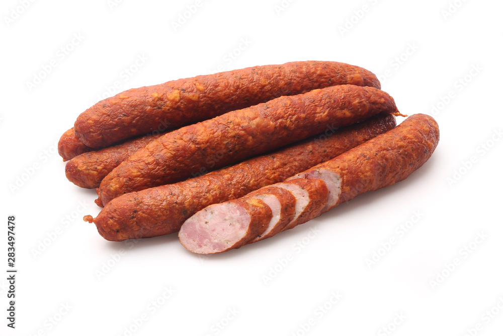 Smoked thin sausage on a white background. Food product. Smoked thin sausage on a white background. Food product.
