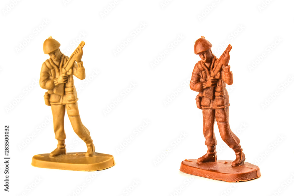 miniature toy soldiers isolated on white background. miniature toy soldiers isolated on white background.