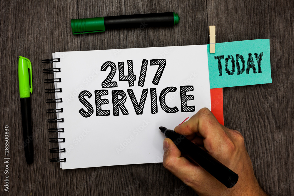 Conceptual hand writing showing 24 7 Service. Business photo showcasing Always available to serve Runs constantly without disruption Man holding marker notebook reminder cup markers wood table Conceptual hand writing showing 24 7 Service. Business photo showcasing Always available to serve Runs constantly without disruption Man holding marker notebook reminder cup markers wood table
