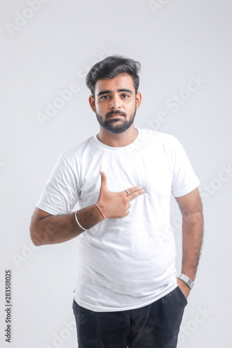 young Indian man giving multiple expression.