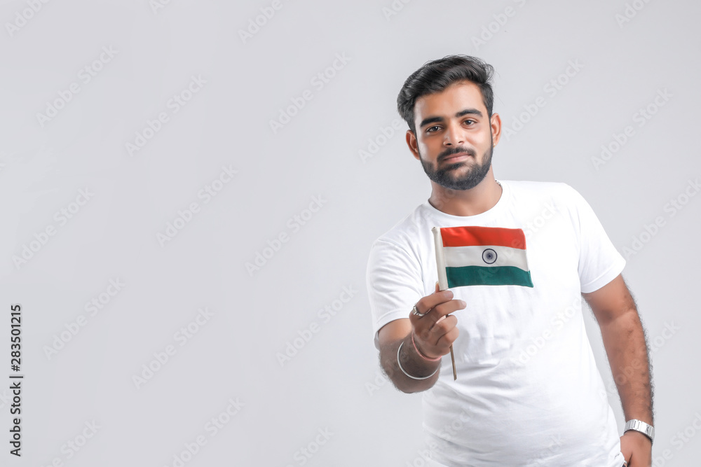 Young indian man with indian flag Young indian man with indian flag
