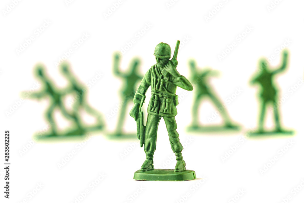 lot of plastic toy soldiers on white background. lot of plastic toy soldiers on white background.