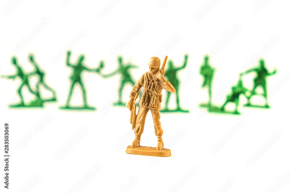 lot of plastic toy soldiers on white background. lot of plastic toy soldiers on white background.