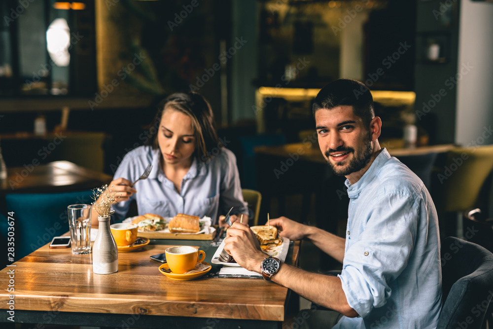 couple on romantic dinner in fancy restaurant
