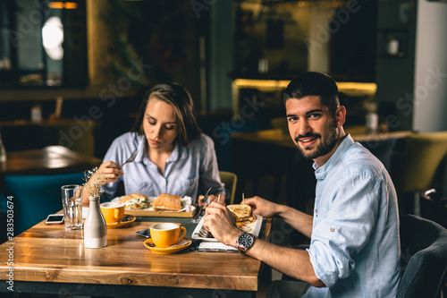 couple on romantic dinner in fancy restaurant