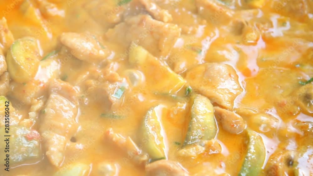 Cooking red curry or panaeng in pan, Thai famous food Cooking red curry or panaeng in pan, Thai famous food