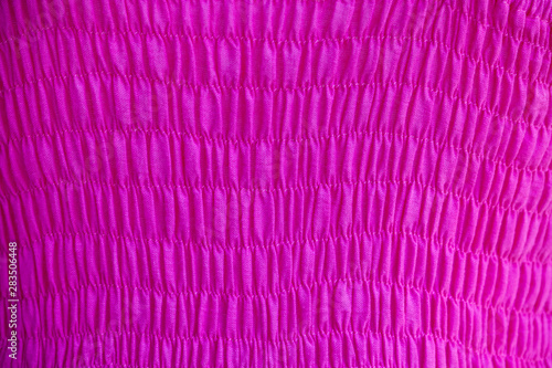 Pattern of pink fabric with bright colors.