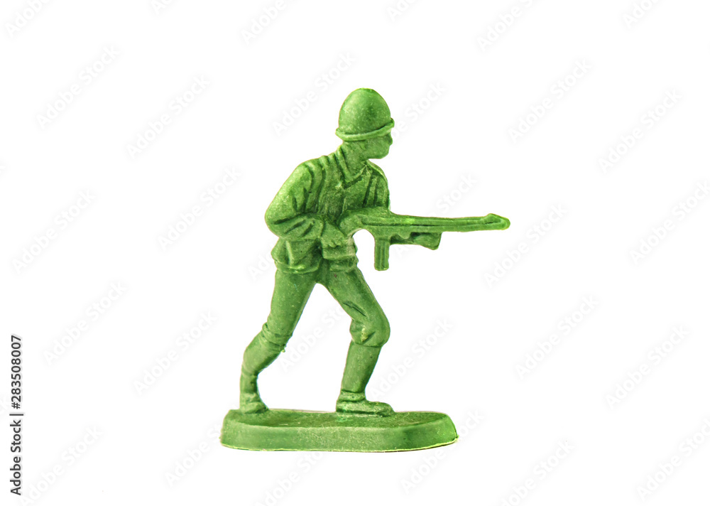 miniature toy soldier on white background, close-up miniature toy soldier on white background, close-up
