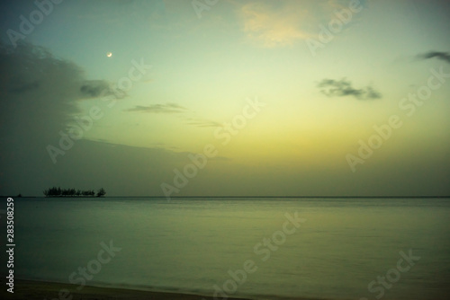 Sunset off the coast of the island of Roatan