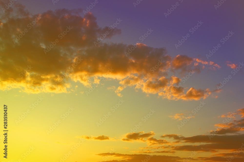 Fototapeta premium amazing unreal colorful fantasy sunset or sunrise cloudy sky for using in design as background.