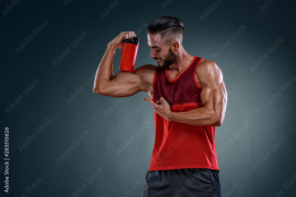 Handsome Muscular Men With Protein Drink Bottle