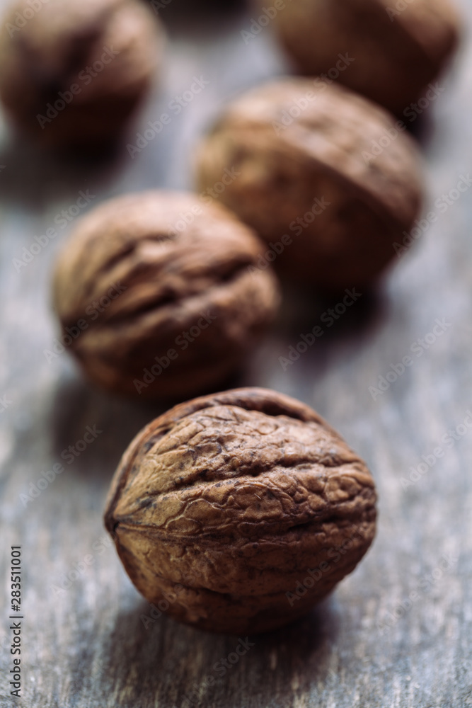 Walnuts with and without shells (filling the picture). Background of fresh walnuts. Walnuts with and without shells (filling the picture). Background of fresh walnuts.