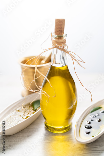 bottle of olive oil and olives